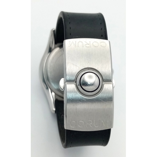59 - A Corum Bubble, Diamond Gents Watch. Model 163.150.20. 
Black leather and rubber strap - With a Coru... 