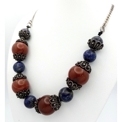 1062 - A vintage 925 silver Lapis Lazuli and Carnelian link necklace. Total length 54cm.