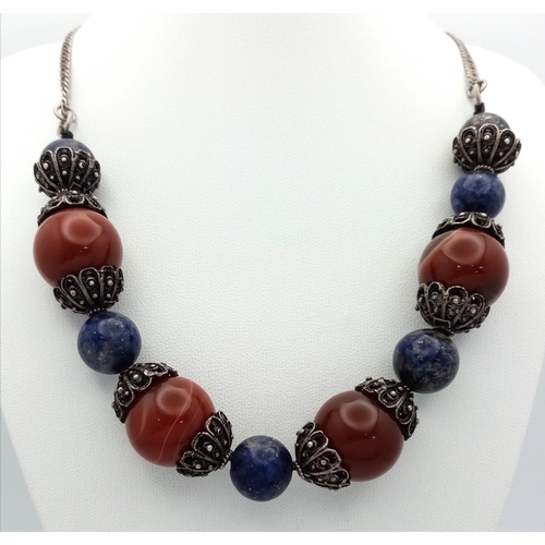 1062 - A vintage 925 silver Lapis Lazuli and Carnelian link necklace. Total length 54cm.