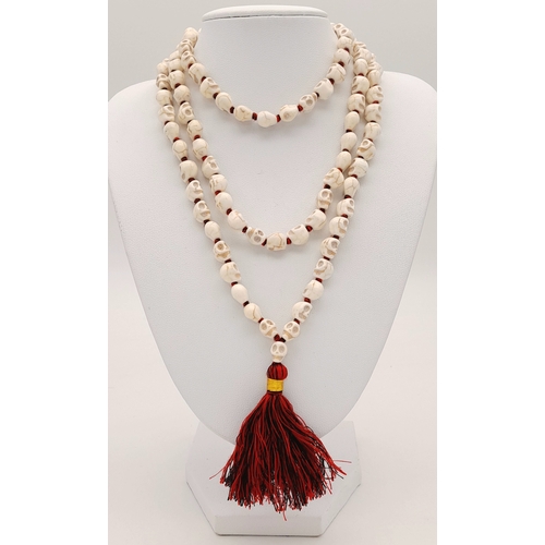 1081 - A matinee length of Skull Mala prayer bead link necklace. Total length 96cm.