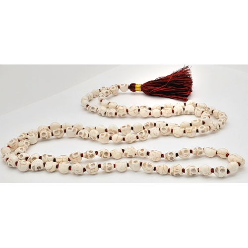1081 - A matinee length of Skull Mala prayer bead link necklace. Total length 96cm.