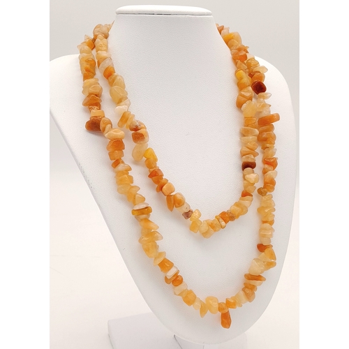 1109 - A matinee length of irregular agate necklace. Total length 86cm.