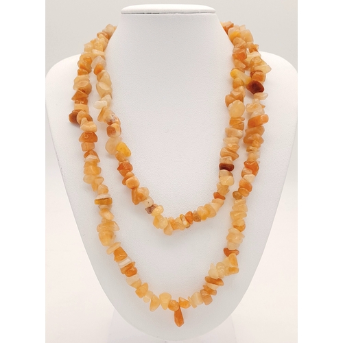 1109 - A matinee length of irregular agate necklace. Total length 86cm.