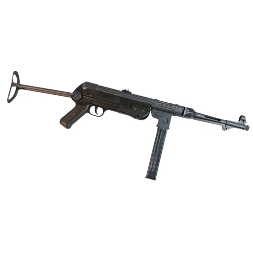 A Rare, Deactivated German SDS 9mm Sub-Machine Gun. Model M38 (BD38). Good condition with bakelite style furniture. Some moving parts - 32 round removable magazine. Comes with an EU deactivation certificate. UK/EU sales only - Not Holland. 63cm length.