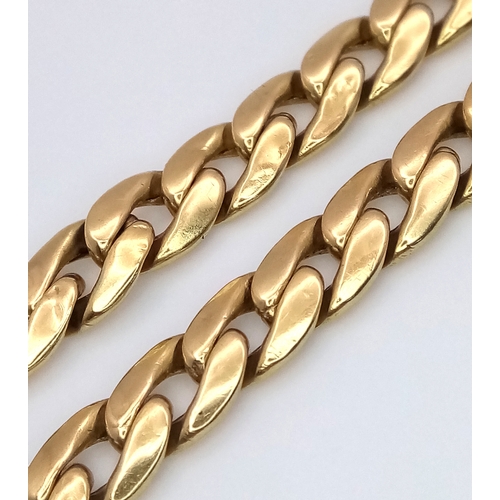 1082 - An 18K Yellow Gold Flat Curb Link Bracelet. Good Condition. 
21cm length. 10.55g.