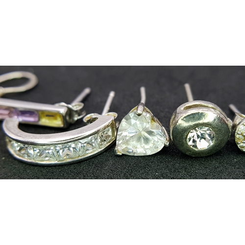 1089 - An assorted collection of 925 silver stone set fashion single earrings with various design. Total we... 