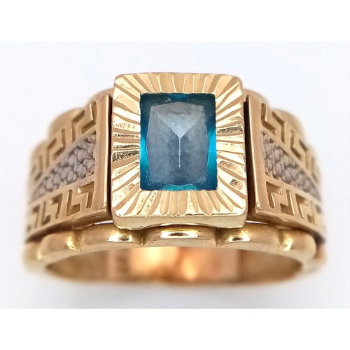 1096 - A 14K Yellow Gold Fancy Blue Topaz Signet Ring. Size R. 7.15g total weight.