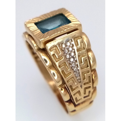 1096 - A 14K Yellow Gold Fancy Blue Topaz Signet Ring. Size R. 7.15g total weight.
