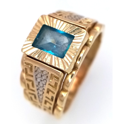 1096 - A 14K Yellow Gold Fancy Blue Topaz Signet Ring. Size R. 7.15g total weight.