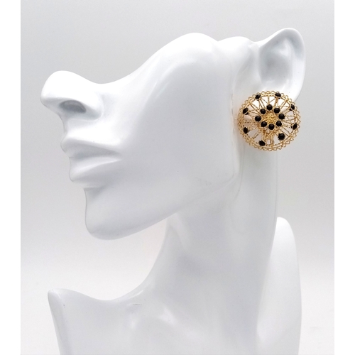 1103 - A Pair of Italian Fancy 18K Gold and Onyx Bead Earrings. Beautiful open-work in a circular form. 33m... 