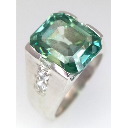 1117 - A 925 Silver 6ct Emerald Cut Blue Moissanite Ring.  Size T. CD-2067