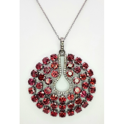 1119 - A 925 Silver Garnet Gemstone Large Circular Pendant, 5.5cm diameter. Comes with a silver chain neckl... 