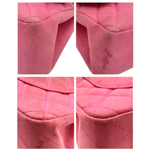 27 - A Chanel Pink Quilted Caviar Leather Double Flap Bag. Pink leather exterior with silver-tone hardwar... 