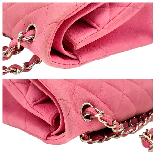 27 - A Chanel Pink Quilted Caviar Leather Double Flap Bag. Pink leather exterior with silver-tone hardwar... 