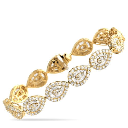 A 14K Yellow Gold 6.05ctw Diamond Bracelet. Stylish and incredibly sophisticated, this piece measures 7.25 inches long and includes sparkling diamonds with a total weight of 6.05 carats. This jewellery piece is offered in excellent condition and includes a gift box. Total weight: 20.2 grams. *This item is held at Cadmore USA Office in Pennsylvania, USA and will be shipped from there. Buyers will be responsible for direct shipping payments.* ID: 305663
