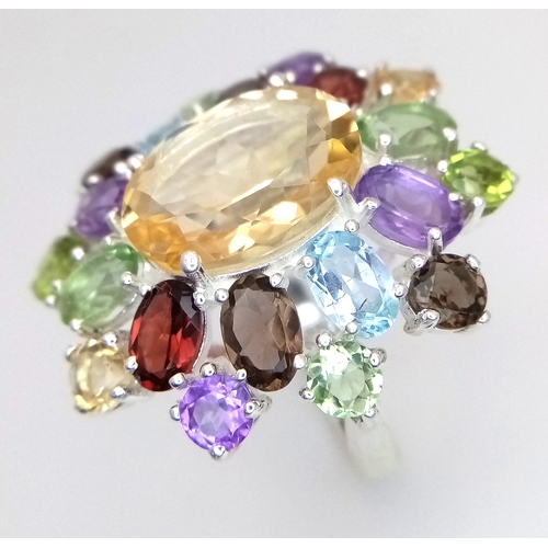 A Multi-Coloured Gemstone Ring Including Amethyst, Citrine and Smoky ...