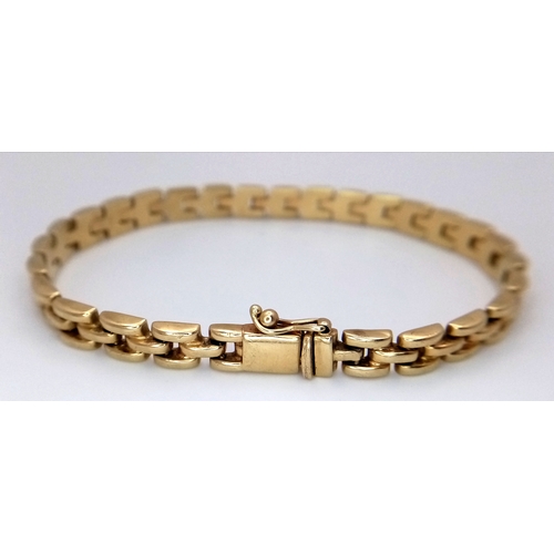 27 - A 14K Yellow Gold Three Row Link Bracelet. 18cm. 11.25g.