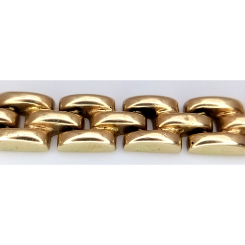 27 - A 14K Yellow Gold Three Row Link Bracelet. 18cm. 11.25g.