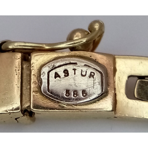 27 - A 14K Yellow Gold Three Row Link Bracelet. 18cm. 11.25g.