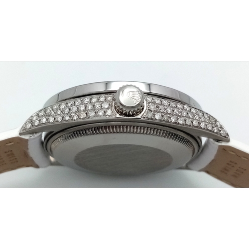 46 - A Custom Rolex Datejust with a Diamond-Paved Dial. White leather strap. Stainless steel case - 36mm.... 