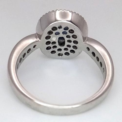 12 - AN 18K WHITE GOLD, DIAMOND AND SAPPHIRE RING. 6.6G, SIZE M 1/2. SC 3068.