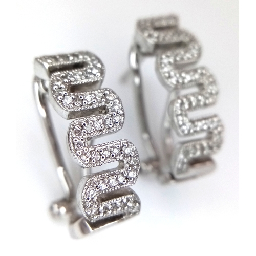 26 - A PAIR OF 18K WHITE GOLD, DIAMOND SET, MIU MIU STYLE, EARRINGS. 0.25 TCW, 5.2G. SC 3091.