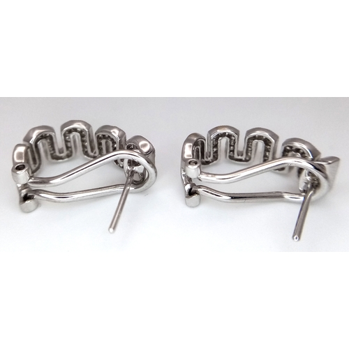 26 - A PAIR OF 18K WHITE GOLD, DIAMOND SET, MIU MIU STYLE, EARRINGS. 0.25 TCW, 5.2G. SC 3091.