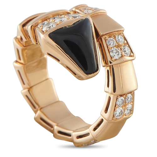 A Bvlgari Serpenti Viper 18K Rose Gold Diamond and Onyx Ring. This rose gold ring features the iconic serpent's head motif with a deep black onyx inlay, contrasting sharply with the alternating polished gold and diamond pav scales. Comes with a gift box. Ring size: 5 (Size J). Total weight: 8.9 grams. *This item is held at Cadmore USA Office in Pennsylvania, USA and will be shipped from there. Buyers will be responsible for direct shipping payments.*