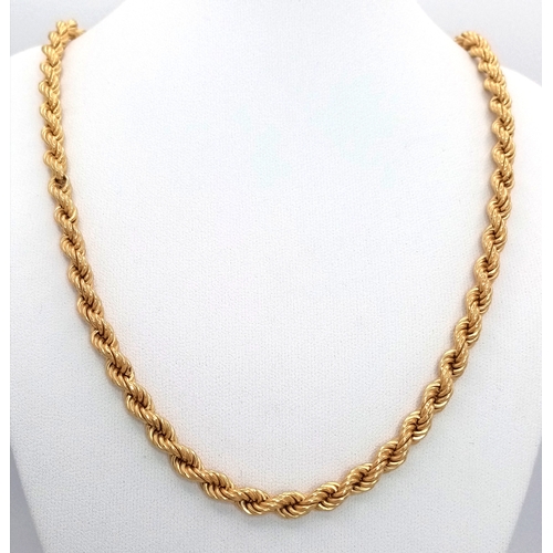 An 18K Yellow Gold Rope Chain Necklace. 58cm. 21.9g. Good condition.