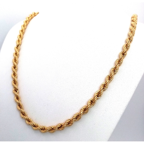 5 - An 18K Yellow Gold Rope Chain Necklace. 58cm. 21.9g. Good condition.