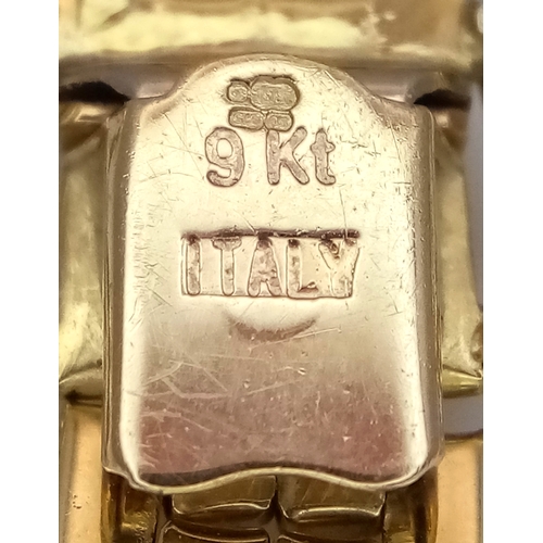 11 - An Italian Tank-Track Link Bracelet. Clip open design. Good condition. 16cm. 11.75g.