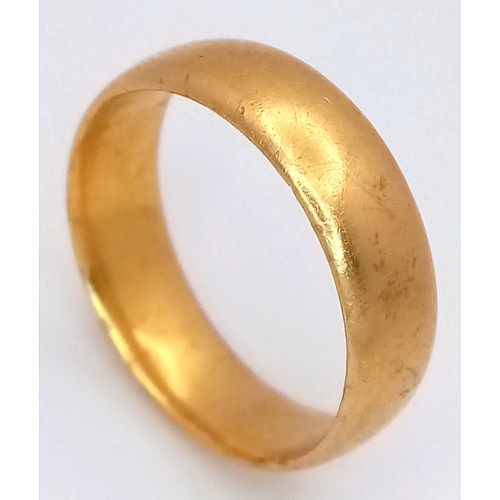 15 - A 22K Yellow Gold Band Ring. 6mm width. Size J. 4.75g.