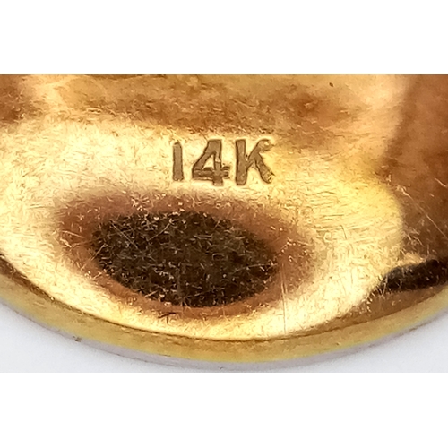 27 - A Pair of 14k Gold and Black Onyx Cufflinks in Circular Form. 8.67g total weight.