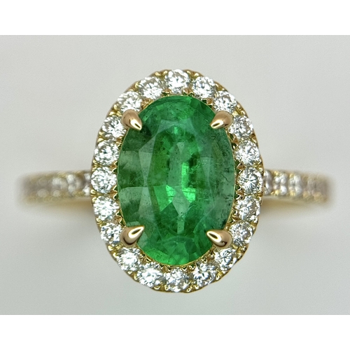 51 - A 14K Yellow Gold Emerald and Diamond Dress Ring. 1.49ct high grade emerald with a 0.43ctw diamond s... 
