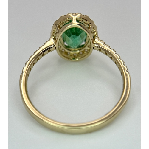 51 - A 14K Yellow Gold Emerald and Diamond Dress Ring. 1.49ct high grade emerald with a 0.43ctw diamond s... 