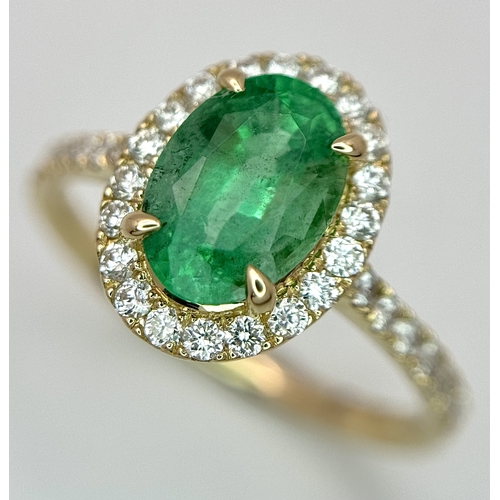 51 - A 14K Yellow Gold Emerald and Diamond Dress Ring. 1.49ct high grade emerald with a 0.43ctw diamond s... 