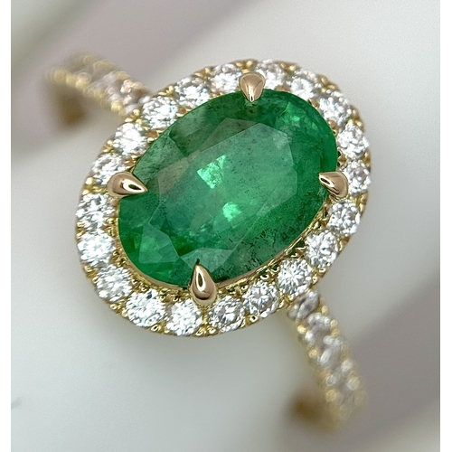 51 - A 14K Yellow Gold Emerald and Diamond Dress Ring. 1.49ct high grade emerald with a 0.43ctw diamond s... 
