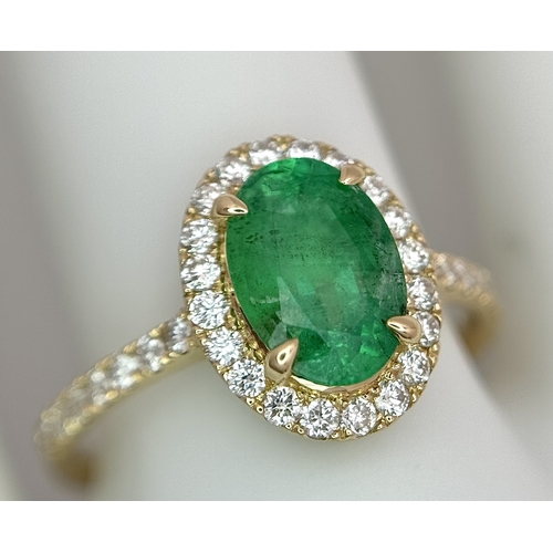 51 - A 14K Yellow Gold Emerald and Diamond Dress Ring. 1.49ct high grade emerald with a 0.43ctw diamond s... 