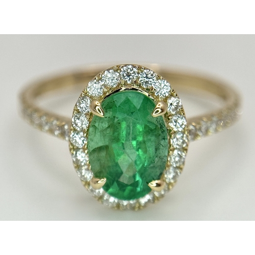 51 - A 14K Yellow Gold Emerald and Diamond Dress Ring. 1.49ct high grade emerald with a 0.43ctw diamond s... 