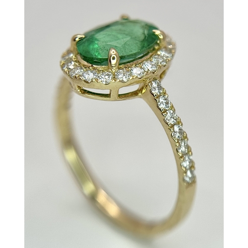 51 - A 14K Yellow Gold Emerald and Diamond Dress Ring. 1.49ct high grade emerald with a 0.43ctw diamond s... 