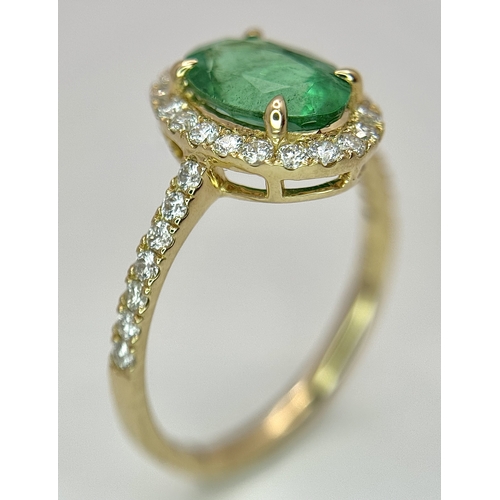 51 - A 14K Yellow Gold Emerald and Diamond Dress Ring. 1.49ct high grade emerald with a 0.43ctw diamond s... 