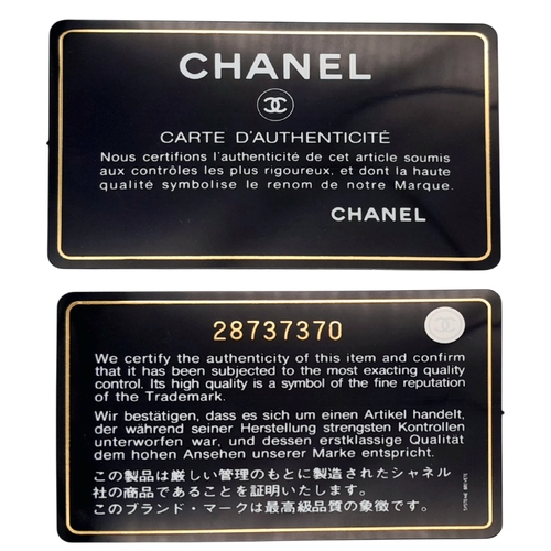 54 - A Chanel Burgundy Shearling Coco Top Handle Bag. Burgundy textile exterior with gold tone hardware, ... 