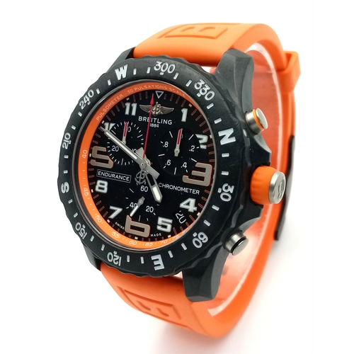 57 - A Breitling Endurance Pro Chronograph Gents Watch. Model WG00244. Orange rubber strap. Black titaniu... 