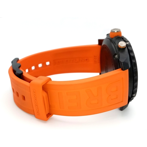 57 - A Breitling Endurance Pro Chronograph Gents Watch. Model WG00244. Orange rubber strap. Black titaniu... 