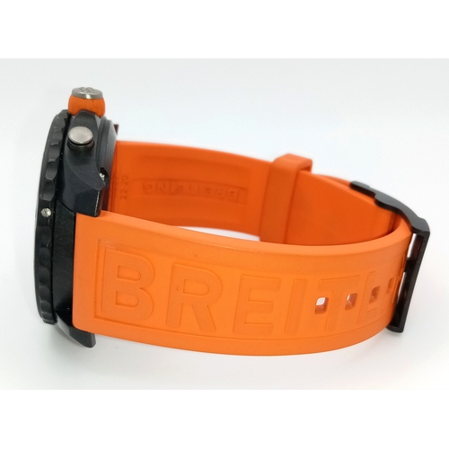 57 - A Breitling Endurance Pro Chronograph Gents Watch. Model WG00244. Orange rubber strap. Black titaniu... 