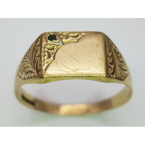 80 - A 9K Yellow Gold Signet Ring. Size V. 3.35g. Small stone missing so as found.