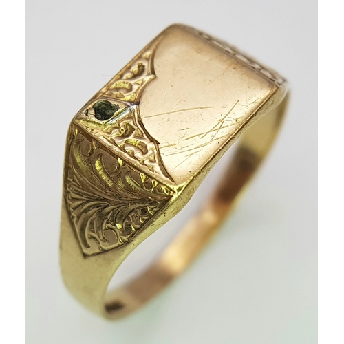 80 - A 9K Yellow Gold Signet Ring. Size V. 3.35g. Small stone missing so as found.