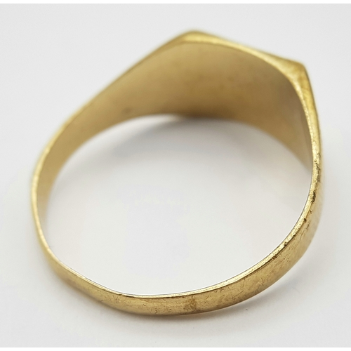 80 - A 9K Yellow Gold Signet Ring. Size V. 3.35g. Small stone missing so as found.