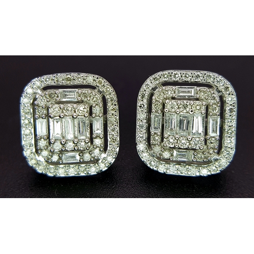 93 - A Pair of 9K White Gold Diamond Dress Earrings. c2ctw of round and baguette cut diamonds. Square stu... 