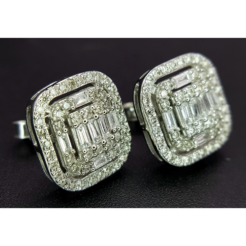 93 - A Pair of 9K White Gold Diamond Dress Earrings. c2ctw of round and baguette cut diamonds. Square stu... 